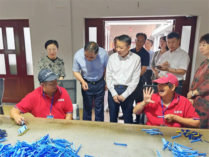 7.10-7.12 省残联廖理调研 - 副本.jpg